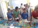 Boys are making a painting